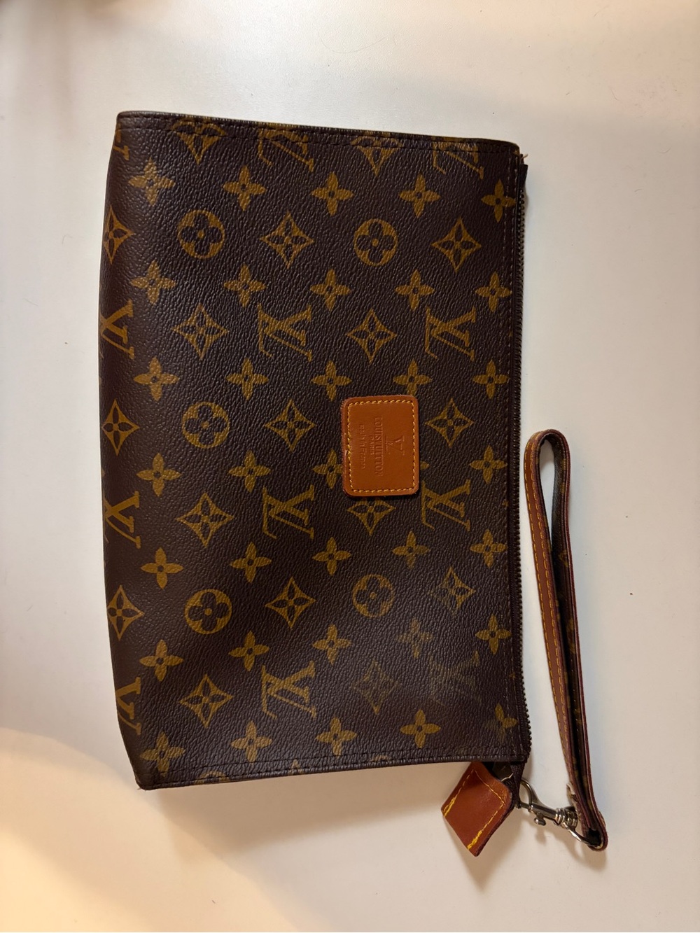 Louis Vuitton Monogram Canvas Wristlet in Brown and Tan
